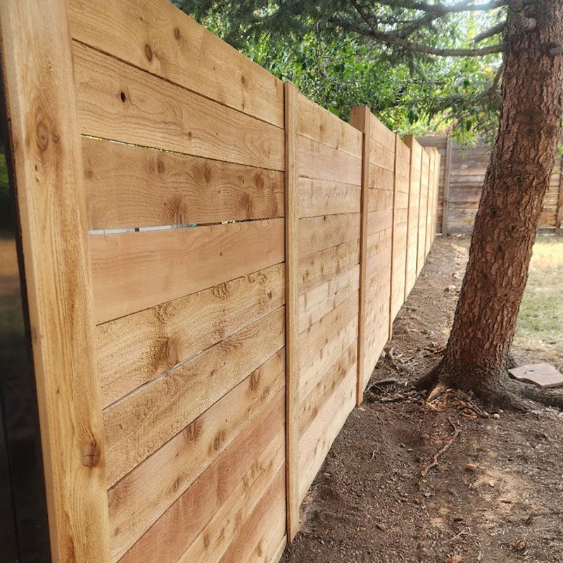 horizontal wood fence in front range