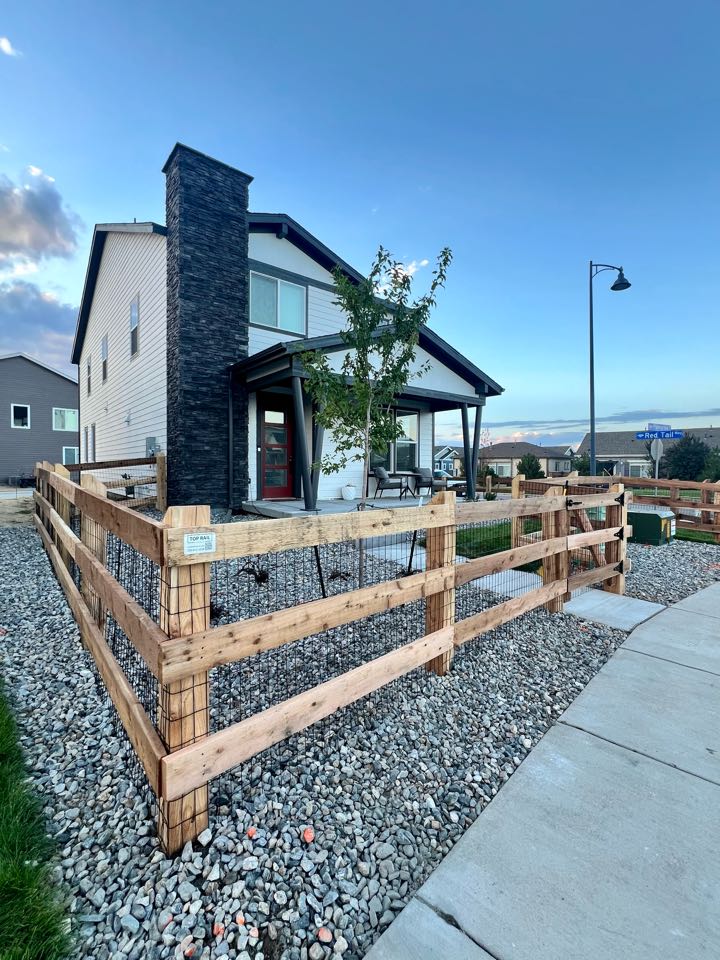 4H ranch rail with black welded wire for an HOA approved fence. Stunning new build with an even more stunning fence to match it! 