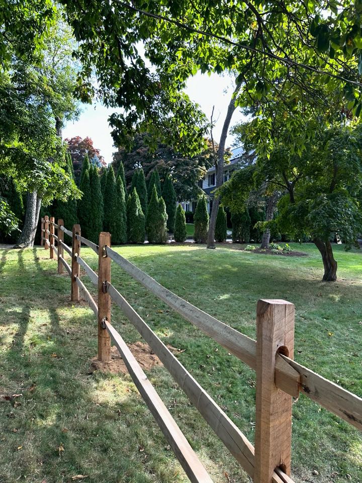 This week, a rustic but beautiful split rail fence in Stamford. Split rail fences date back to Colonial times, when they were used to designate property lines and to protect farm animals. But even today, they can provide the perfect decorative touch and, in this case really elevated the look of our most recent customers’ property.