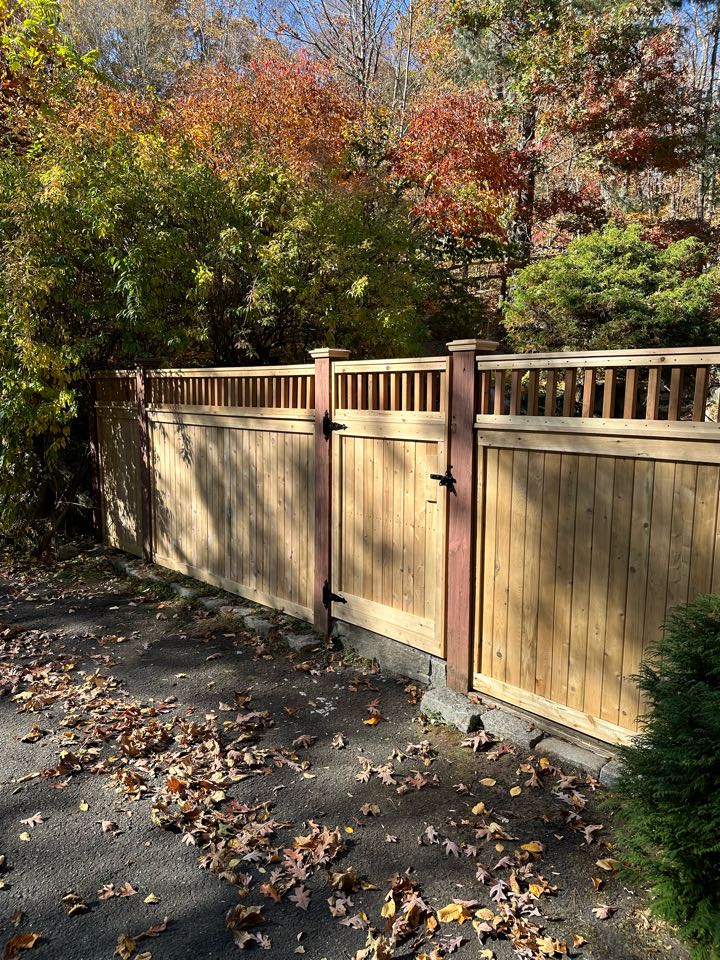 Another successful fence installation, this time a beautiful 6 foot custom cedar fence with a capped picket top and matching gates around the pool and pool equipment in Stamford.