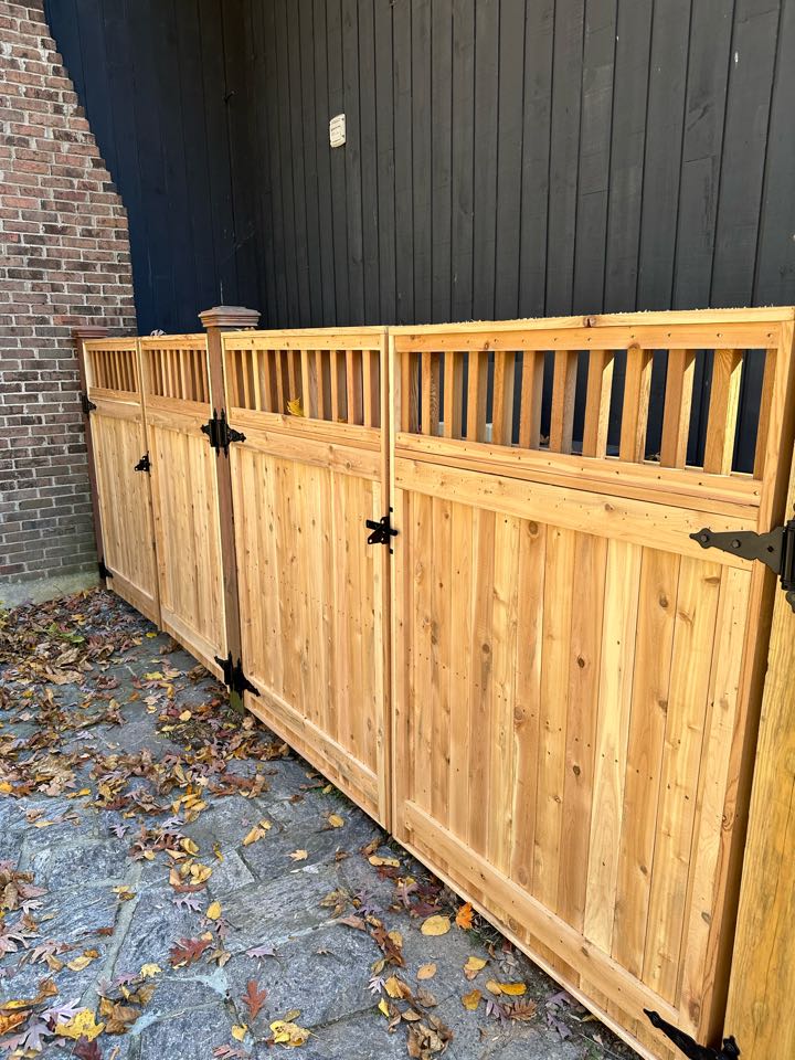 Another successful fence installation, this time a beautiful 6 foot custom cedar fence with a capped picket top and matching gates around the pool and pool equipment in Stamford.