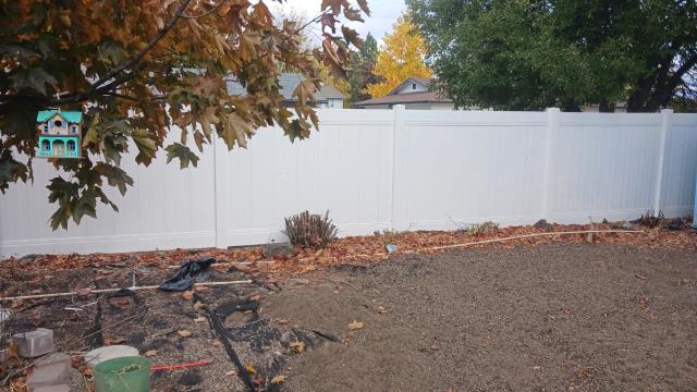 Replaced the very old wood back fence with a great white vinyl that will last twice as long. 