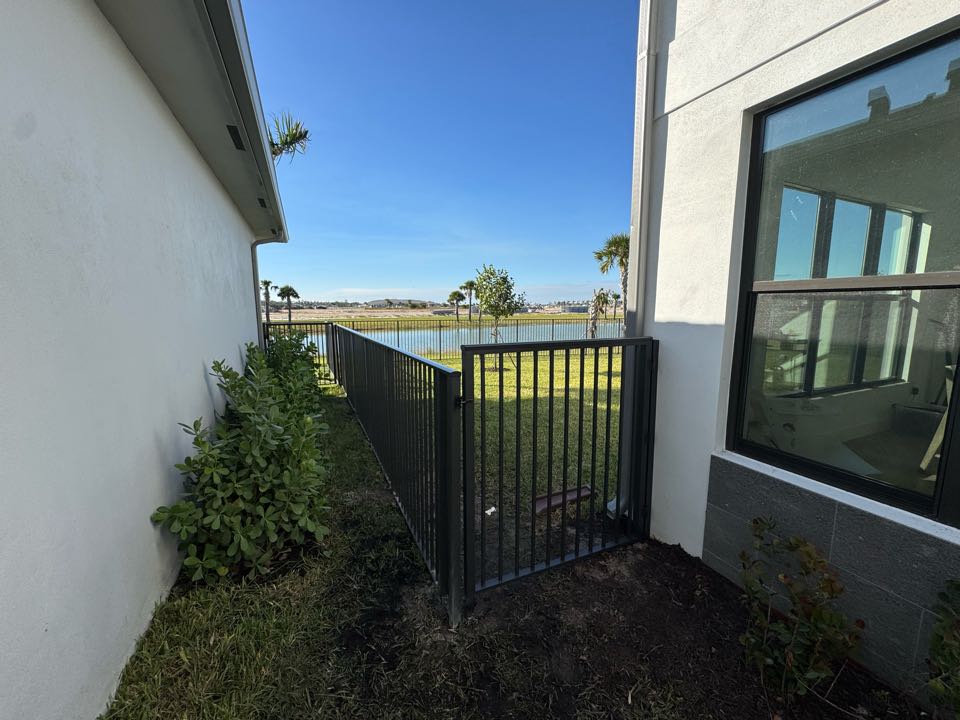In the new Apex at Avenir community in Palm Beach Gardens, FL, we installed a 5-foot bronze aluminum fence with two gates for a young family with a little one and a couple of dogs. This durable, stylish fence keeps their yard secure while blending perfectly with the modern aesthetic of the neighborhood. At Top Rail Fence, we’re here to help families create safe and beautiful spaces they can enjoy for years to come.