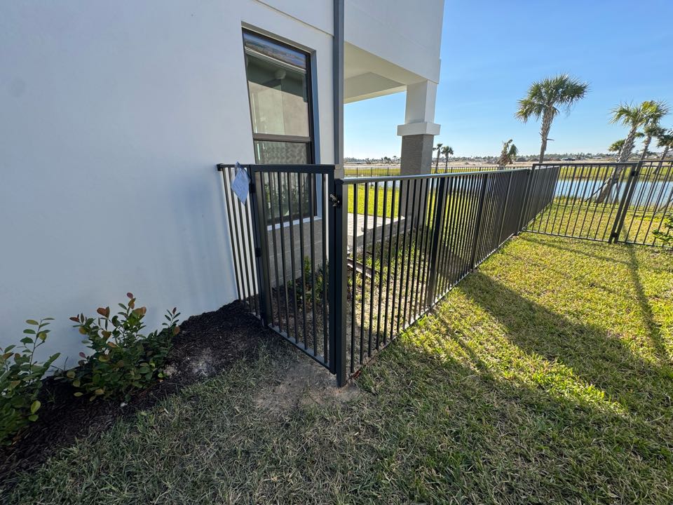 In the new Apex at Avenir community in Palm Beach Gardens, FL, we installed a 5-foot bronze aluminum fence with two gates for a young family with a little one and a couple of dogs. This durable, stylish fence keeps their yard secure while blending perfectly with the modern aesthetic of the neighborhood. At Top Rail Fence, we’re here to help families create safe and beautiful spaces they can enjoy for years to come.