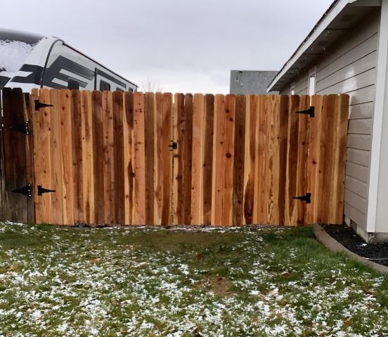 Our customer wanted to be able to put her RV behind her side fence so we turned it into a double gate. Turned out great!