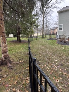 Customer rescues dogs. She wanted to provide a nice area for them to roam around. We installed around 200 feet of 4' high black aluminum fence in Dublin, OH. 
