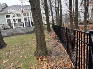 Customer rescues dogs. She wanted to provide a nice area for them to roam around. We installed around 200 feet of 4' high black aluminum fence in Dublin, OH. 