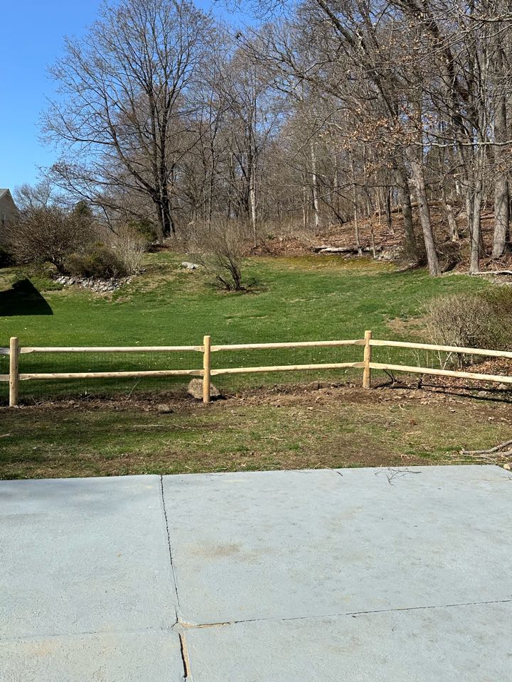 Just finished a beautiful and functional cedar post and rail fence with welded wire attached in Norwalk! Our customer’s dog is now safe and free to roam the back yard, and the property got some added curb appeal!