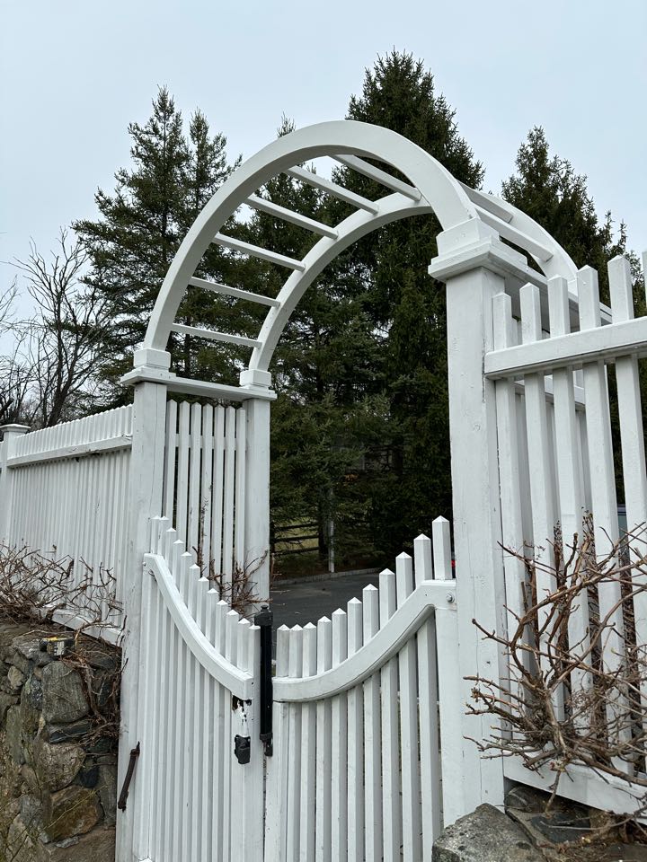Just completed a beautiful new white vinyl arbor and cedar arbor top painted white in Darien!