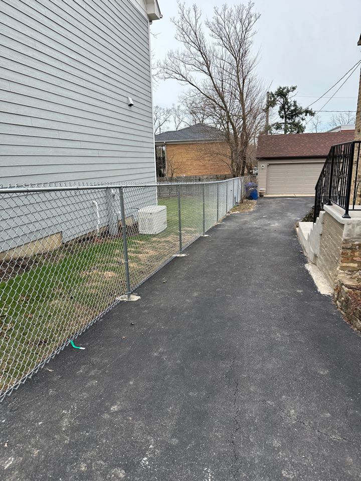 Installed 5’ tall chain link fence for a customer in Wheaton. 