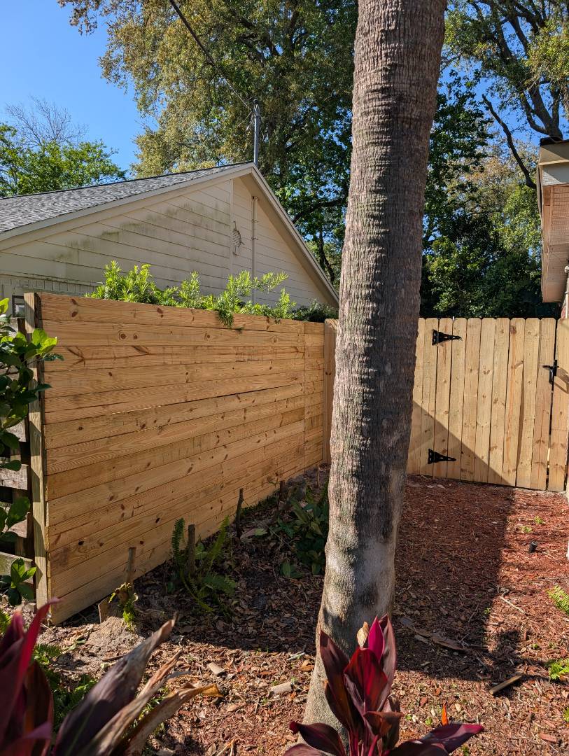Horizontal Pine fence with a little Stockade on the front in Jax Beach 