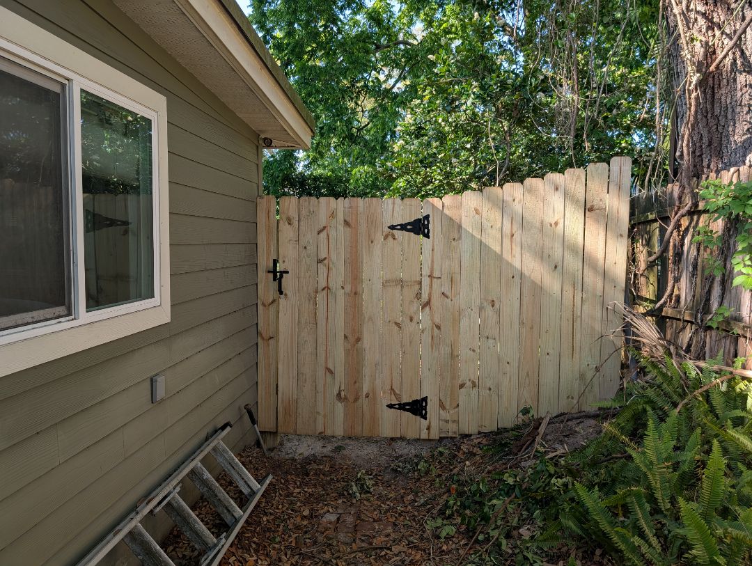 Horizontal Pine fence with a little Stockade on the front in Jax Beach 