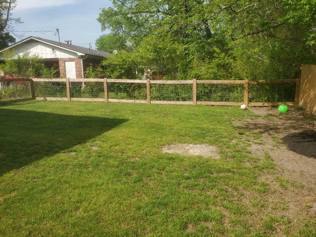 4ft tall 2 rail fence for backyard in Rome, GA. Complete with 2x4 welded wire. Its hard to beat our value for the money. Top Rail Fence Chattanooga. 