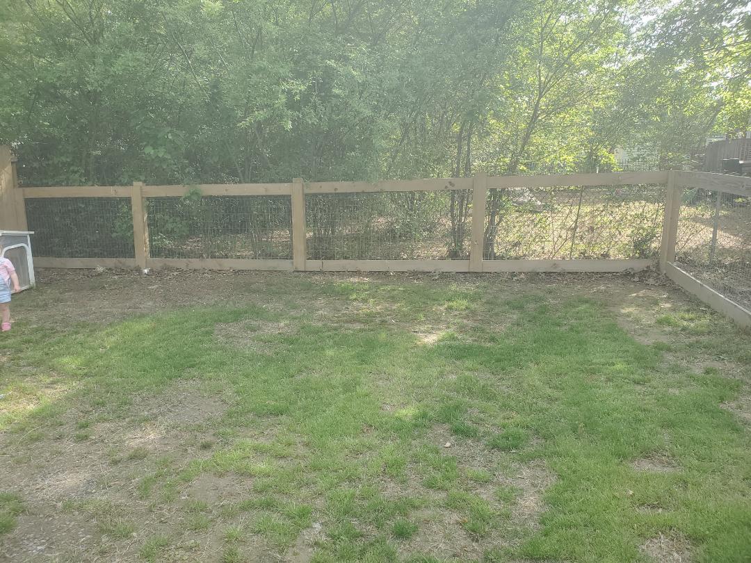 4ft tall 2 rail fence for backyard in Rome, GA. Complete with 2x4 welded wire. Its hard to beat our value for the money. Top Rail Fence Chattanooga. 