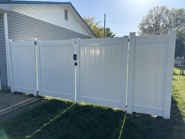 274 feet of 6’ high white vinyl privacy fence installed. 