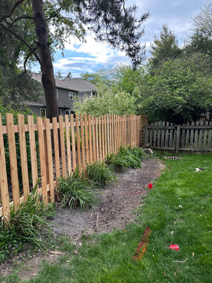 Customer wanted to replace the picket fence in the back yard in Wheaton. We installed an arched top picket fence. Turned out great. 