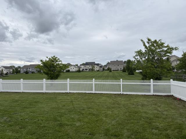212 feet of 4’ high white vinyl picket fence installed. 