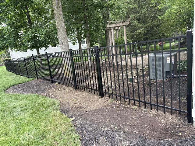 211 feet of 4' high black aluminum fence installed (Nobility Aluminum).
