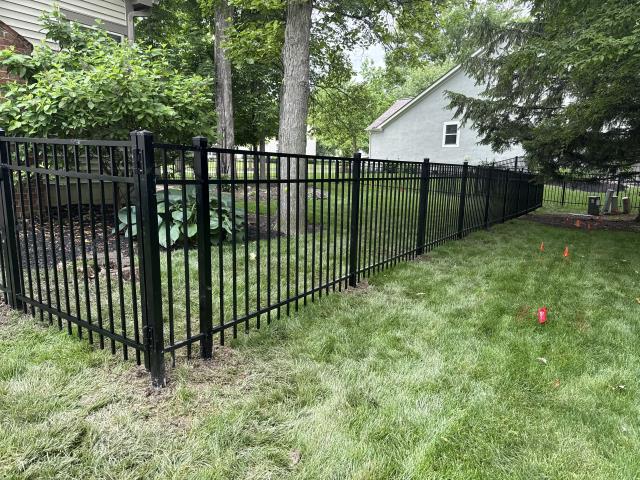 211 feet of 4' high black aluminum fence installed (Nobility Aluminum).