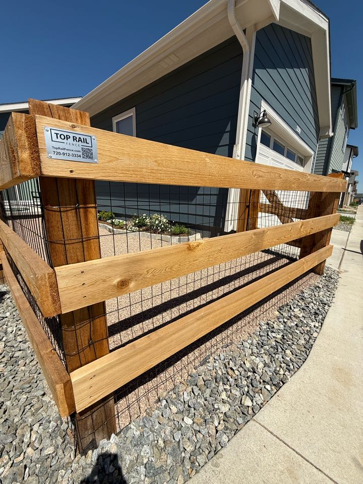 Top rail fence finished another 4 foot high ranch rail fence with black welded wire in the beautiful new neighborhood in Brighton Colorado! 