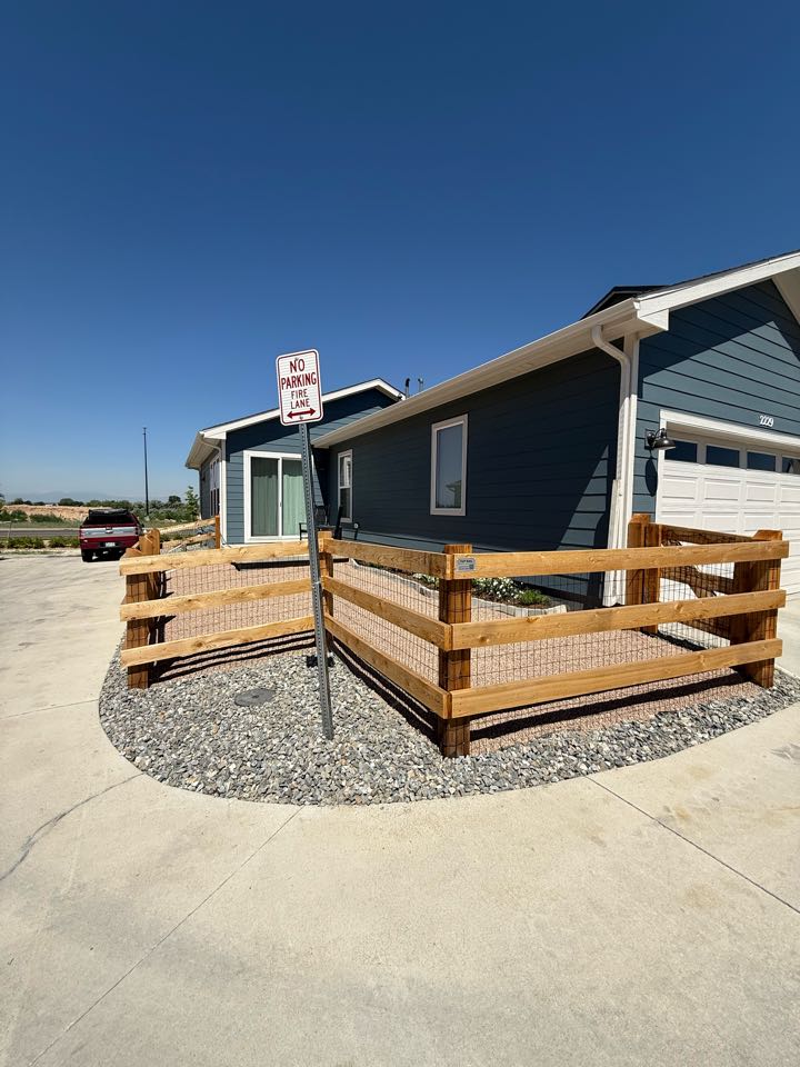 Top rail fence finished another 4 foot high ranch rail fence with black welded wire in the beautiful new neighborhood in Brighton Colorado! 