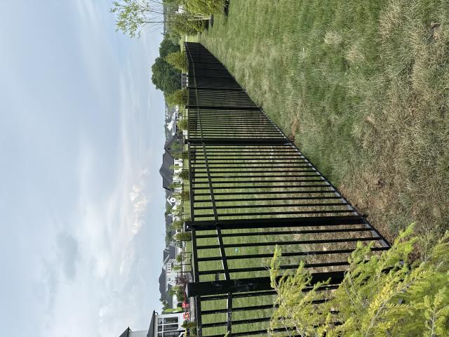 360 feet of 4.5' high black aluminum fence installed (Nobility Aluminum).