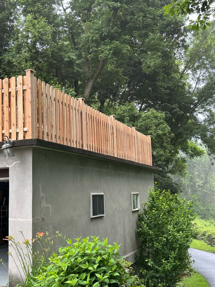 A fun one this week in Greenwich! Fence material on top of a garage to create a beautiful outdoor living space. A cedar board on board shadowbox fence creates safety and privacy, all while allowing air flow for these brutally hot summer days!