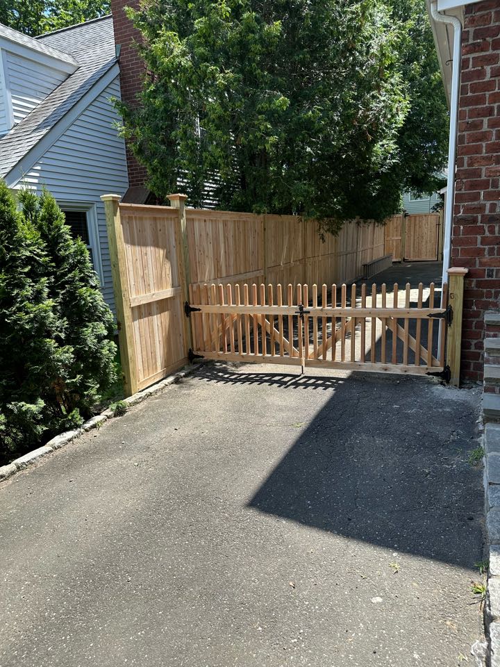 Just finished an amazing project in Old Greenwich! A 3ft tall cedar picket fence in the front yard and driveway gates, and a 6ft tall cedar privacy fence in the back. Dogs and kids are now safe to run around outside, and all done with classic New England charm!