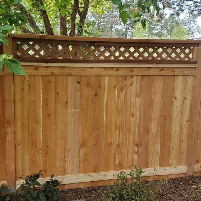 stockade wood fence with lattice top