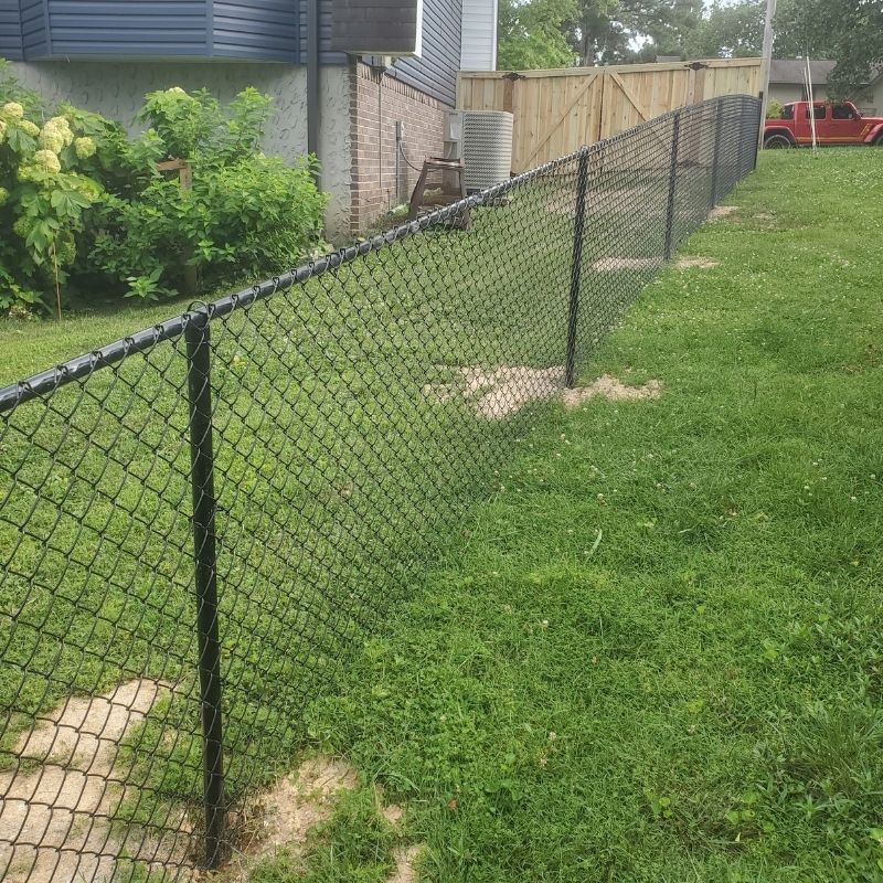 chain link fence installed by top rail fence