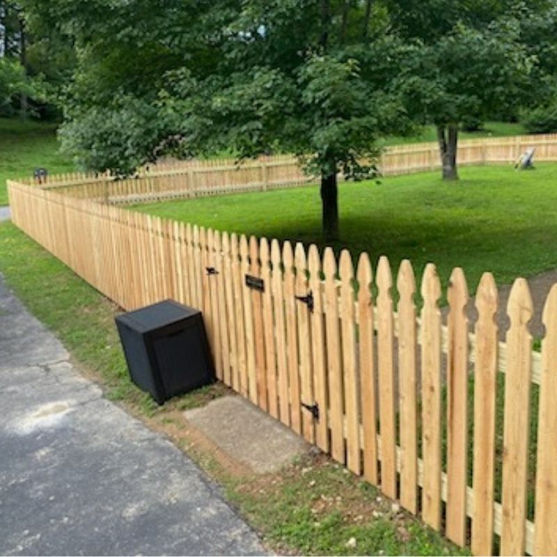Cedar Gothic Picket Fence installation by Top Rail Fence