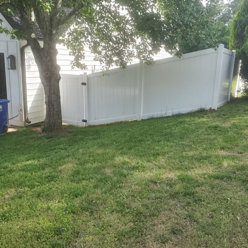Vinyl Privacy Fence Installation by Top Rail Fence