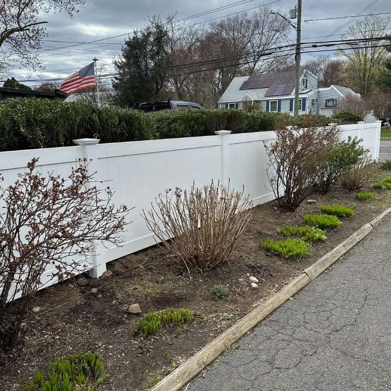 white vinyl privacy fence installed by Top Rail Fence