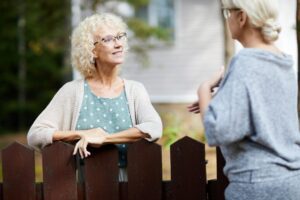 neighbors talking over the fence