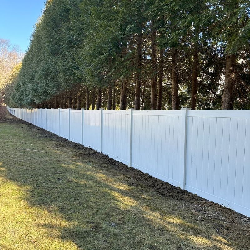 white vinyl fence installed by Top Rail Fence