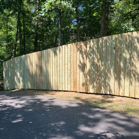 board on board wood fence installation