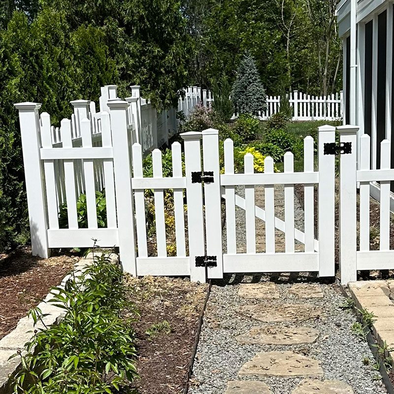 white vinyl picket fence