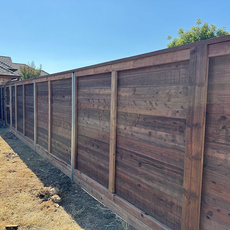 horizontal wood fence with cap and trim