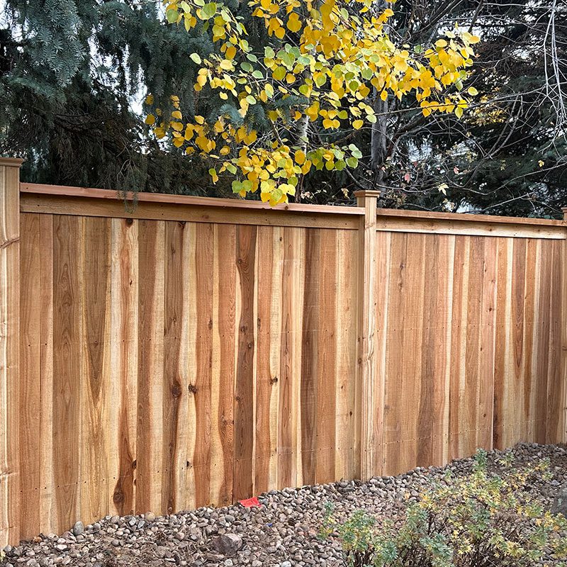 cap and trim wood fence