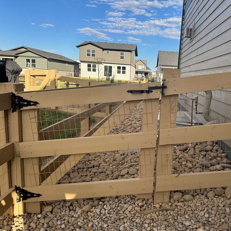 wood post and rail fence and gate in fort collins