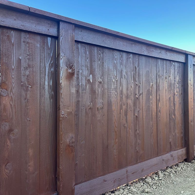 cap and trim wooden fence