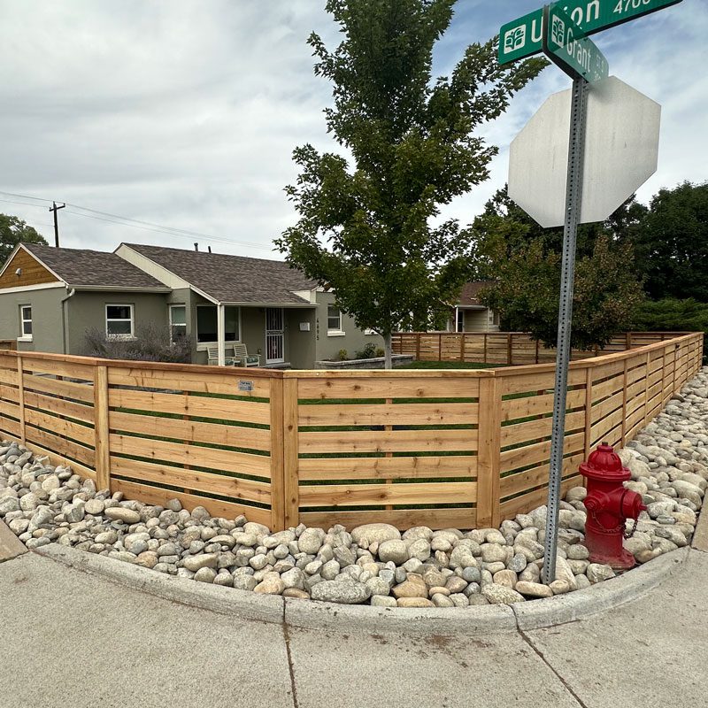 horizontal wood fence with spaced boards