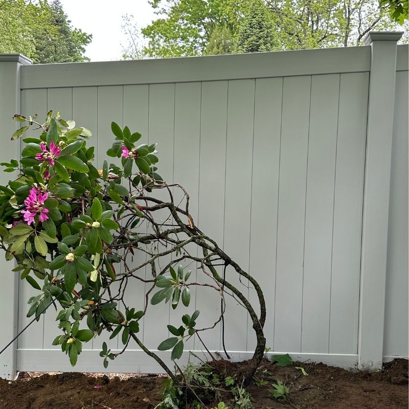 Vinyl privacy fence installed by Top Rail Fence