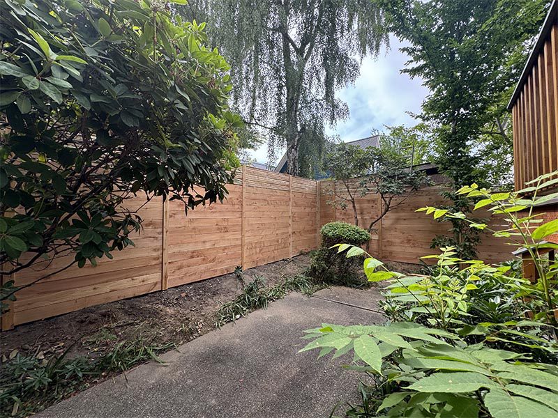 Wood privacy fence installation in Seattle