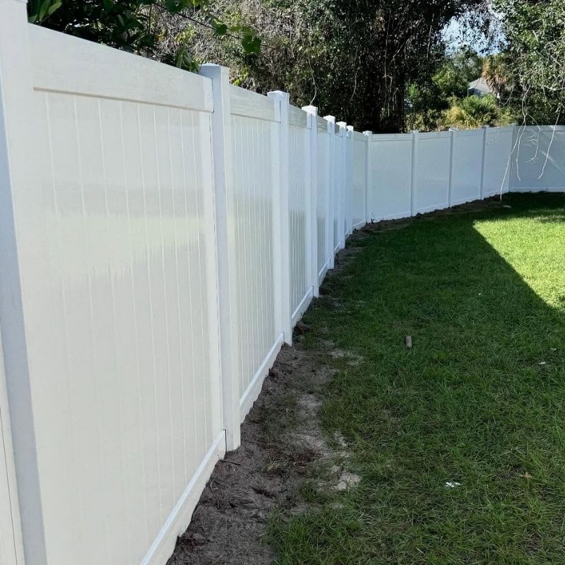 white vinyl fence