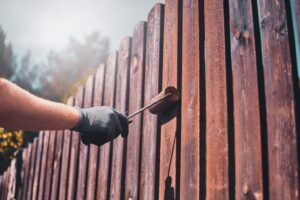 painting a wood fence