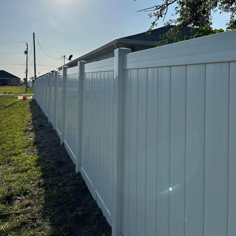White vinyl privacy fence